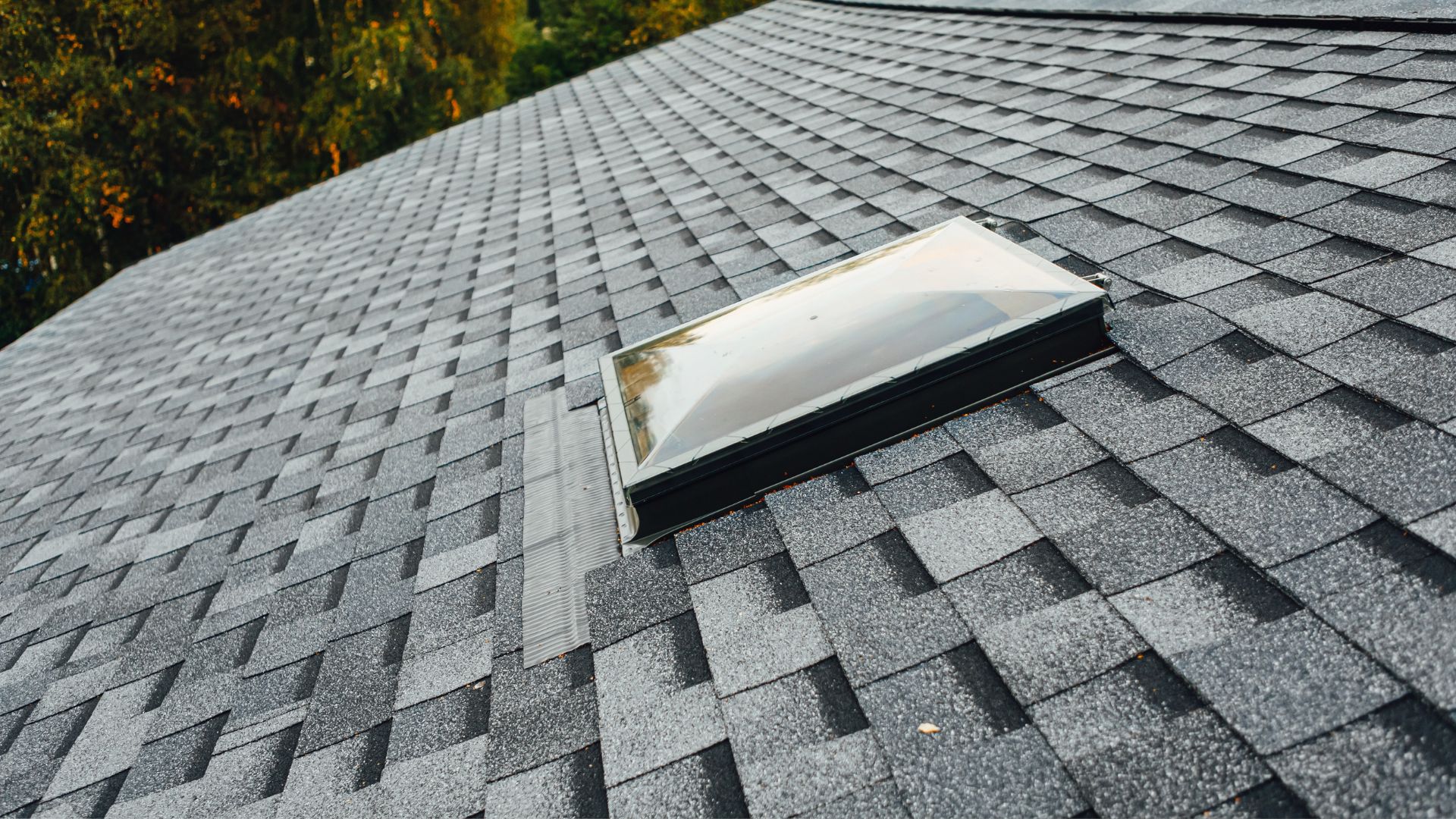 A roof that has a skylight on top of it